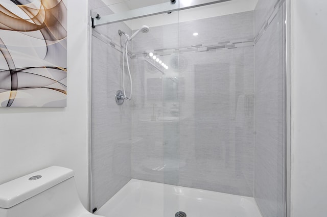 7678 Courtyard Run W, Boca Raton, FL 33433 - bathroom with a stall shower and toilet
