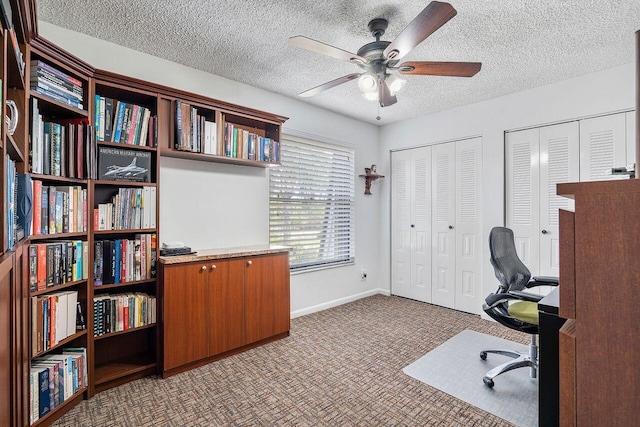 7678 Courtyard Run W, Boca Raton, FL 33433 - office area with ceiling fan, carpet flooring, a textured ceiling, and baseboards