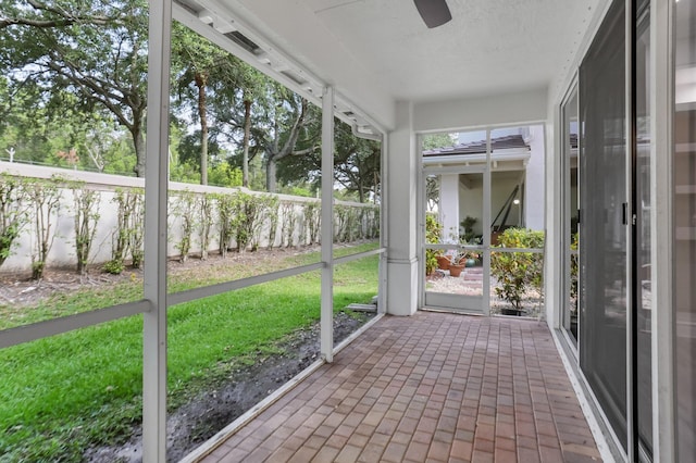 6365 Bella Cir Unit 705, Boynton Beach, FL 33437 - unfurnished sunroom featuring a ceiling fan