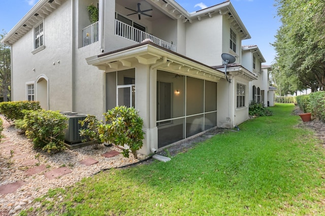 6365 Bella Cir Unit 705, Boynton Beach, FL 33437 - back of house with a balcony, a ceiling fan, central AC unit, a sunroom, and stucco siding