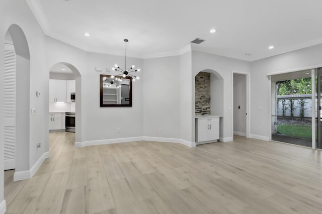 6365 Bella Cir Unit 705, Boynton Beach, FL 33437 - spare room featuring recessed lighting, light wood-type flooring, a chandelier, ornamental molding, and baseboards