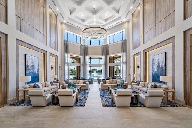 7208 Corning Cir, Boynton Beach, FL 33437 - building lobby featuring a high ceiling, coffered ceiling, beam ceiling, and recessed lighting