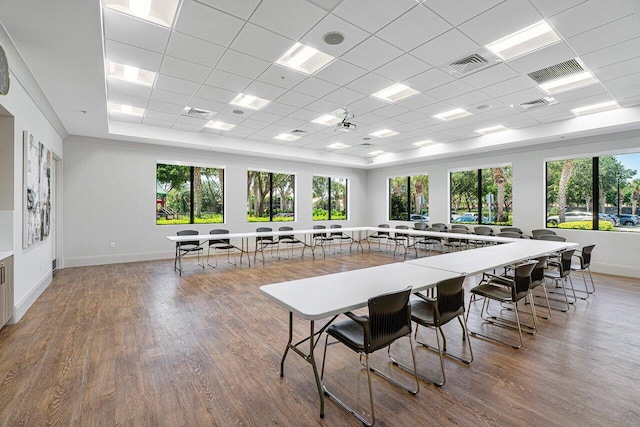 7208 Corning Cir, Boynton Beach, FL 33437 - dining room featuring wood finished floors, a paneled ceiling, and baseboards