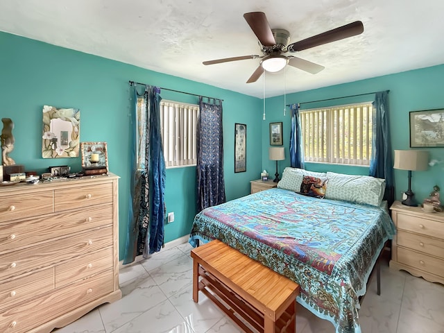 8650 NW 29th St, Sunrise, FL 33322 - bedroom with light marble finish floors and ceiling fan