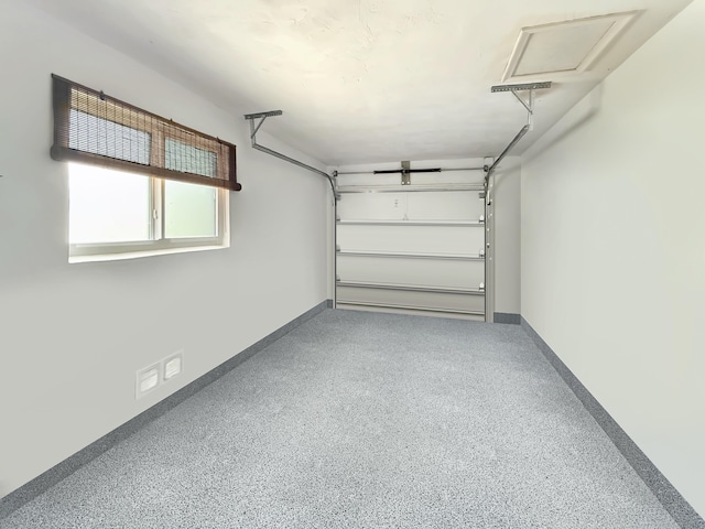 8650 NW 29th St, Sunrise, FL 33322 - garage featuring baseboards