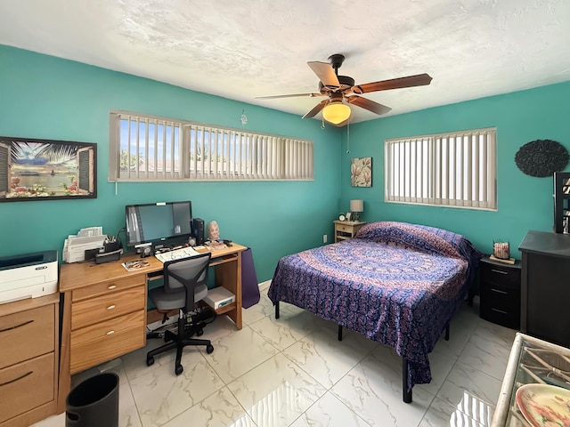 8650 NW 29th St, Sunrise, FL 33322 - bedroom featuring light marble finish floors, a desk, and a ceiling fan