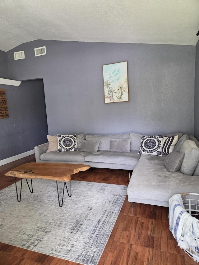 152 NW 14th Ave, Boynton Beach, FL 33435 - living room featuring lofted ceiling, wood finished floors, and baseboards