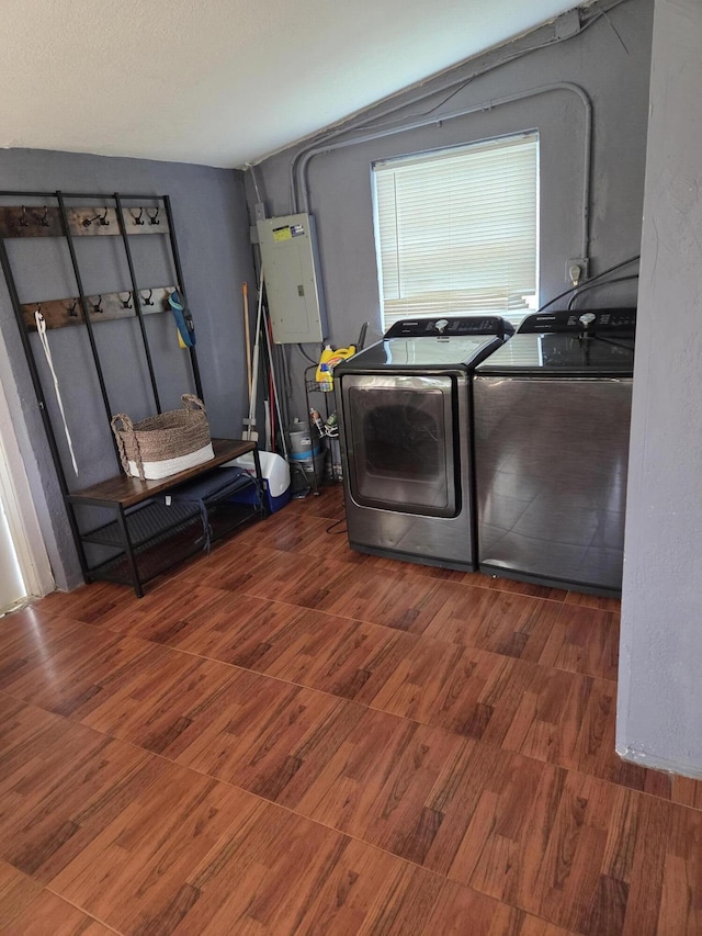 152 NW 14th Ave, Boynton Beach, FL 33435 - washroom with electric panel, independent washer and dryer, and wood finished floors