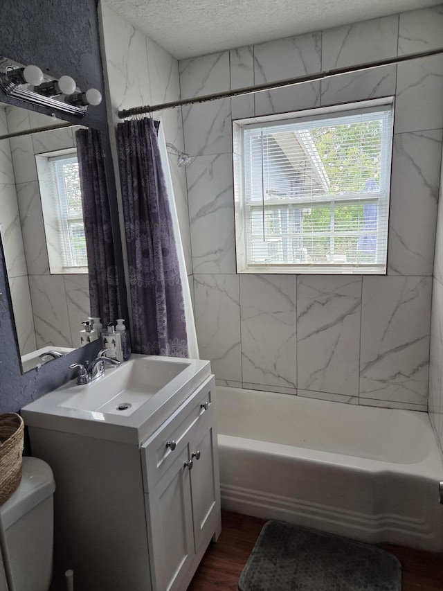 152 NW 14th Ave, Boynton Beach, FL 33435 - full bath featuring vanity, toilet, shower / bathtub combination with curtain, a textured ceiling, and wood finished floors