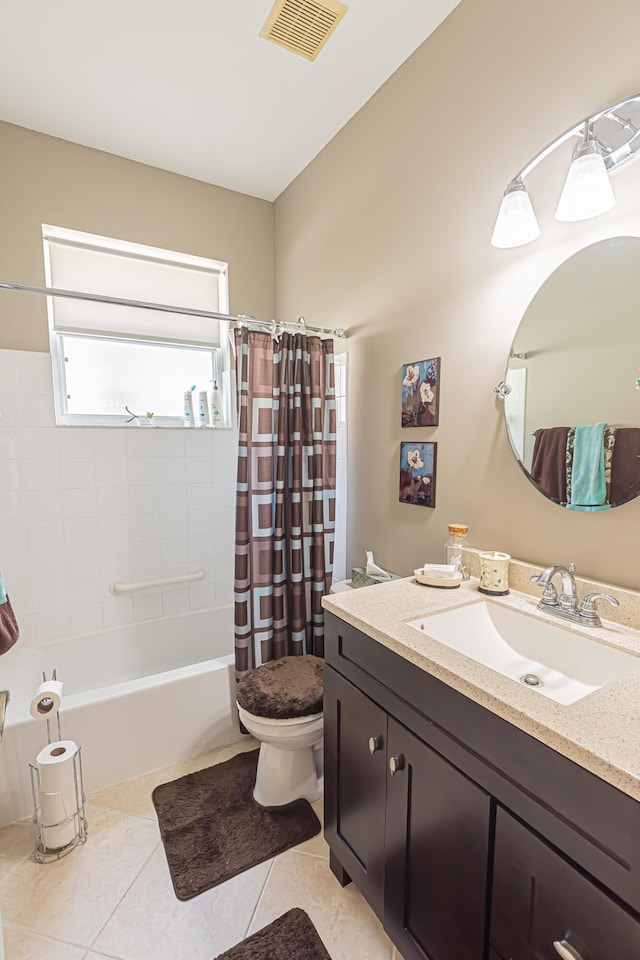 590 NW Cortina Ln, Port Saint Lucie, FL 34986 - full bathroom with vanity, toilet, shower / bathtub combination with curtain, and tile patterned floors