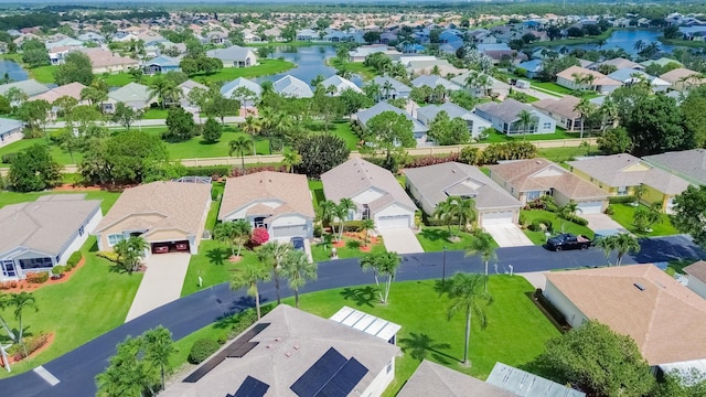 590 NW Cortina Ln, Port Saint Lucie, FL 34986 - aerial view of residential area featuring a large body of water