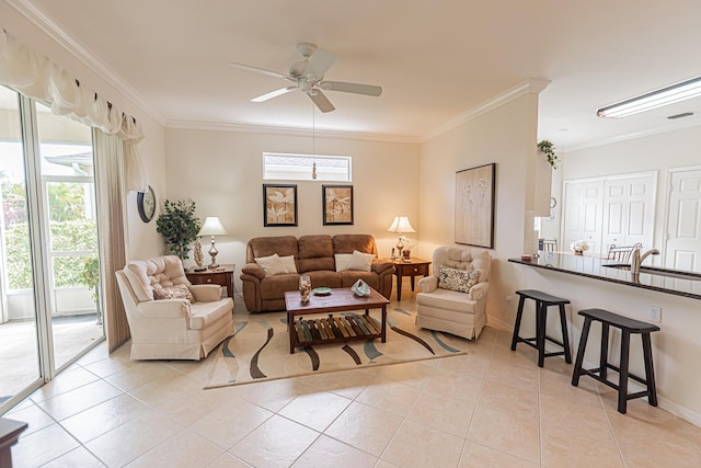 590 NW Cortina Ln, Port Saint Lucie, FL 34986 - living area with light tile patterned flooring, ceiling fan, and ornamental molding