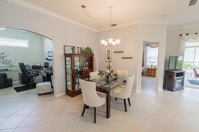 590 NW Cortina Ln, Port Saint Lucie, FL 34986 - dining room featuring a chandelier, crown molding, light tile patterned floors, arched walkways, and a desk