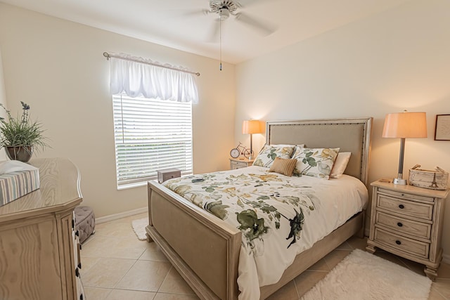 590 NW Cortina Ln, Port Saint Lucie, FL 34986 - bedroom with light tile patterned flooring, baseboards, and ceiling fan