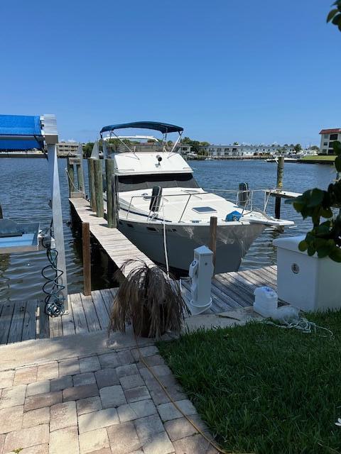 400 Northlake Ct Unit 201, North Palm Beach, FL 33408 - dock featuring a water view