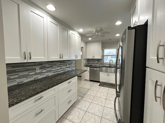 5725 Fernley Dr E Unit 71, West Palm Beach, FL 33415 - kitchen featuring stainless steel appliances, recessed lighting, decorative backsplash, white cabinetry, and a ceiling fan