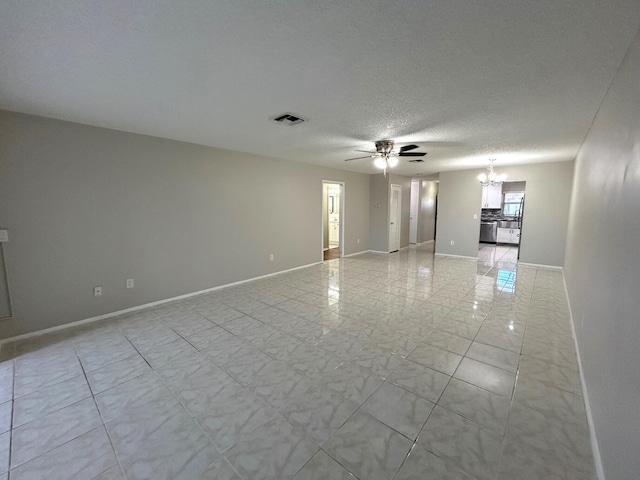 5725 Fernley Dr E Unit 71, West Palm Beach, FL 33415 - unfurnished room with a chandelier, ceiling fan, baseboards, and a textured ceiling