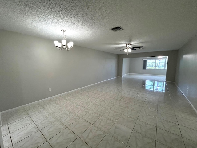 5725 Fernley Dr E Unit 71, West Palm Beach, FL 33415 - unfurnished room with a ceiling fan, a chandelier, a textured ceiling, and baseboards