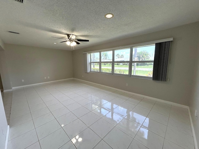5725 Fernley Dr E Unit 71, West Palm Beach, FL 33415 - spare room featuring a textured ceiling, light tile patterned flooring, a ceiling fan, baseboards, and recessed lighting