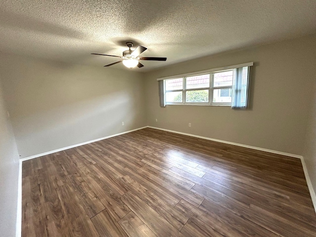 5725 Fernley Dr E Unit 71, West Palm Beach, FL 33415 - unfurnished room featuring dark wood-type flooring, ceiling fan, a textured ceiling, and baseboards