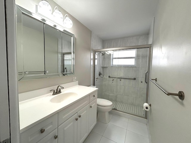 5725 Fernley Dr E Unit 71, West Palm Beach, FL 33415 - full bath featuring toilet, tile patterned floors, vanity, and a stall shower