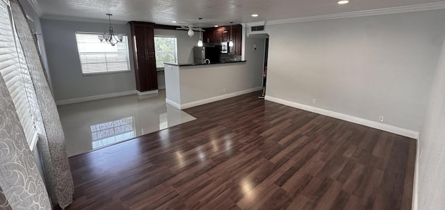 420 Normandy I 420, Delray Beach, FL 33484 - kitchen featuring freestanding refrigerator, a chandelier, crown molding, baseboards, and dark countertops