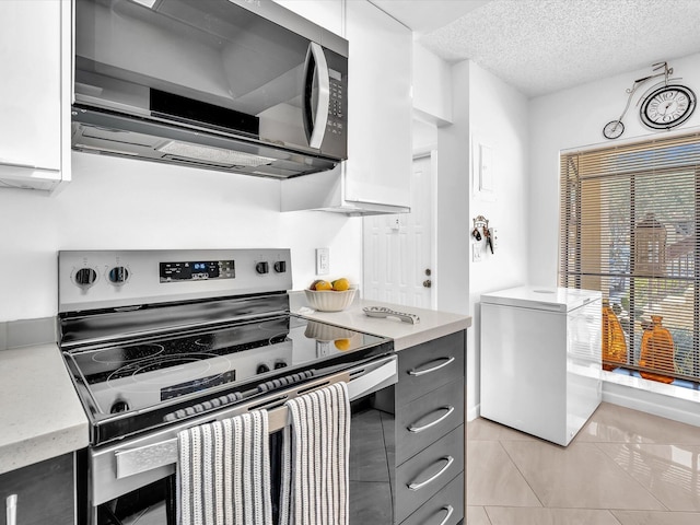 2027 SW 15th St Unit 177, Deerfield Beach, FL 33442 - kitchen with stainless steel appliances and a textured ceiling