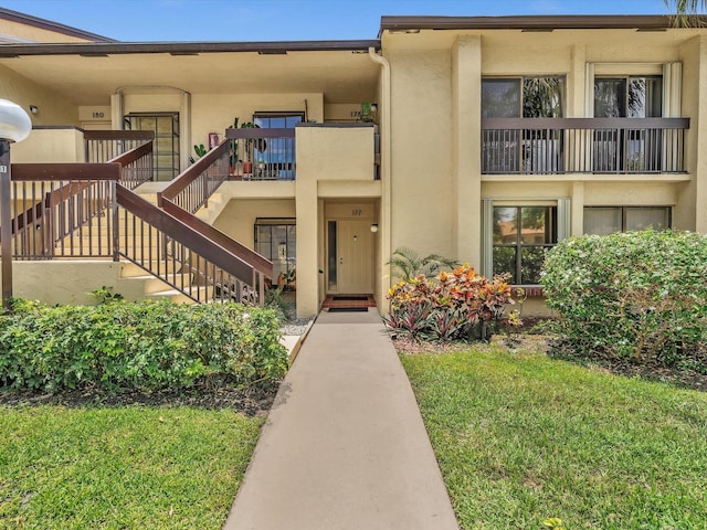 2027 SW 15th St Unit 177, Deerfield Beach, FL 33442 - view of property featuring stairs