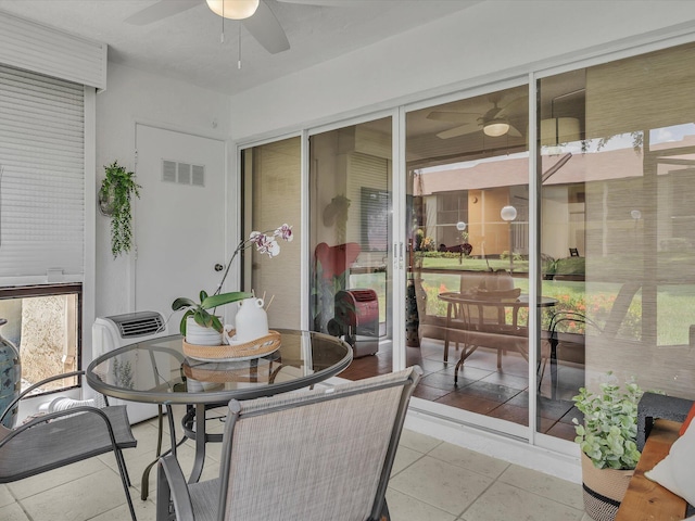 2027 SW 15th St Unit 177, Deerfield Beach, FL 33442 - sunroom / solarium featuring ceiling fan and outdoor dining area