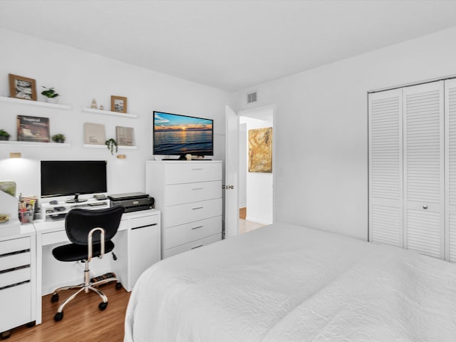 2027 SW 15th St Unit 177, Deerfield Beach, FL 33442 - bedroom featuring light wood-type flooring, a closet, and an office area