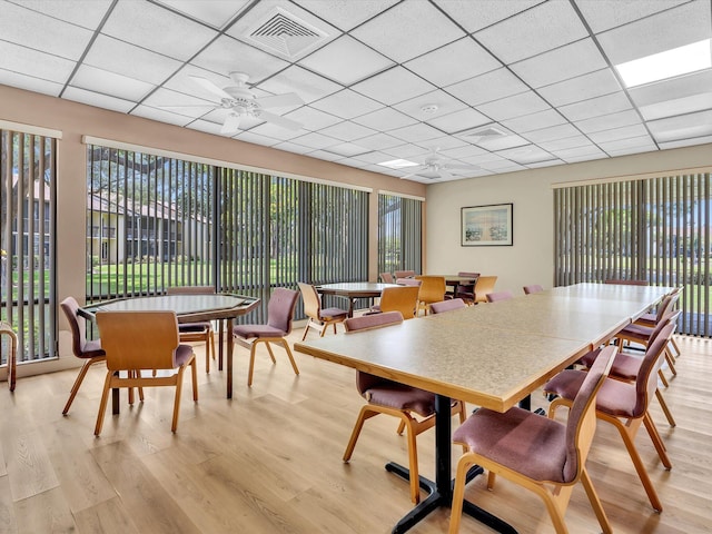 2027 SW 15th St Unit 177, Deerfield Beach, FL 33442 - dining space featuring light wood-type flooring, ceiling fan, and a drop ceiling