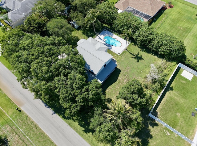 2033 SW Justison Ave, Port Saint Lucie, FL 34953 - drone / aerial view of a pool area