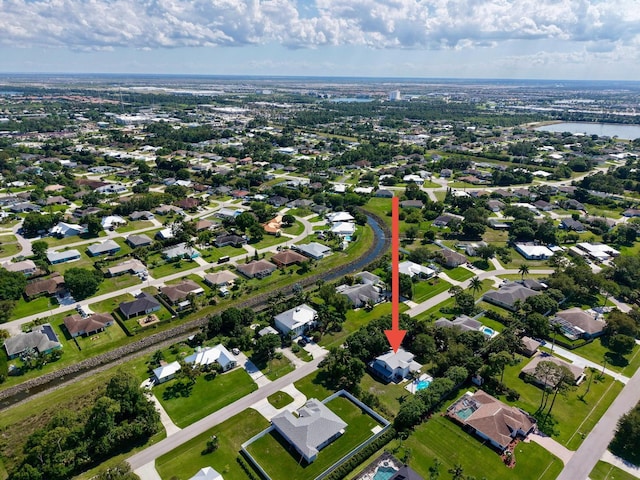 2033 SW Justison Ave, Port Saint Lucie, FL 34953 - aerial view of property and surrounding area featuring a large body of water