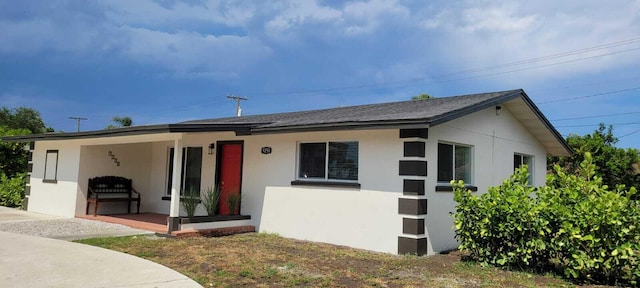9258 N Military Trl, Palm Beach Gardens, FL 33410 - ranch-style home with stucco siding and covered porch