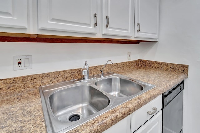 650 SW 2nd Ave Unit 150, Boca Raton, FL 33432 - kitchen view of a sink, stainless steel dishwasher, white cabinetry, and light countertops