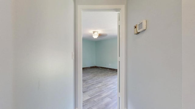 2569 SE Grand Dr, Port Saint Lucie, FL 34952 - hallway with wood finished floors and baseboards
