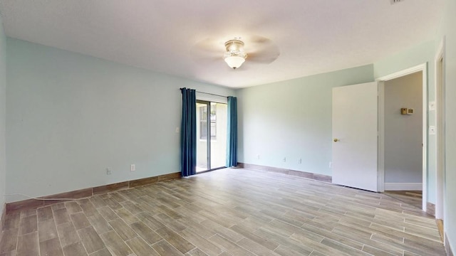 2569 SE Grand Dr, Port Saint Lucie, FL 34952 - unfurnished room with ceiling fan, light wood-style floors, and baseboards