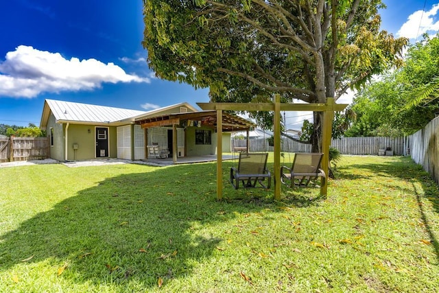2569 SE Grand Dr, Port Saint Lucie, FL 34952 - view of yard featuring a patio area
