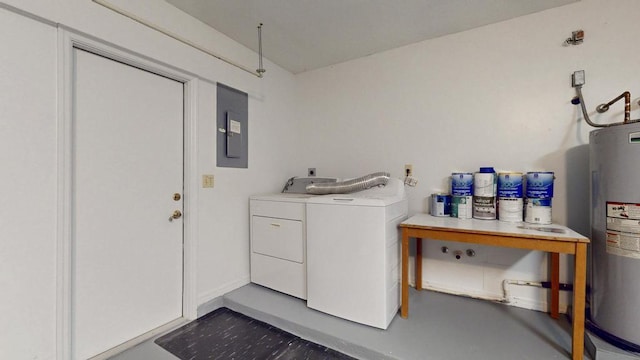 2569 SE Grand Dr, Port Saint Lucie, FL 34952 - laundry room featuring washing machine and clothes dryer, electric panel, and water heater