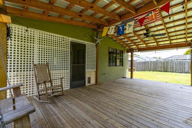2569 SE Grand Dr, Port Saint Lucie, FL 34952 - wooden deck featuring a ceiling fan