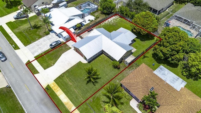 2569 SE Grand Dr, Port Saint Lucie, FL 34952 - aerial view of property and surrounding area with property boundaries highlighted