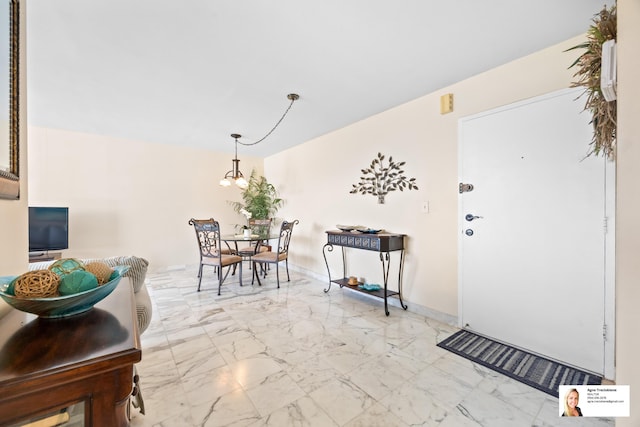 137 Golden Isles Dr Unit 804, Hallandale Beach, FL 33009 - entrance foyer featuring light marble finish floors