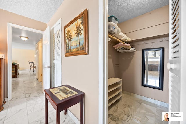 137 Golden Isles Dr Unit 804, Hallandale Beach, FL 33009 - spacious closet with light marble finish floors