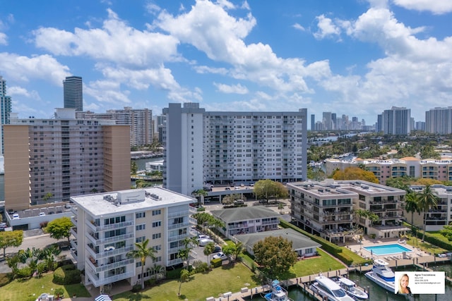 137 Golden Isles Dr Unit 804, Hallandale Beach, FL 33009 - drone / aerial view of city skyline and a pool