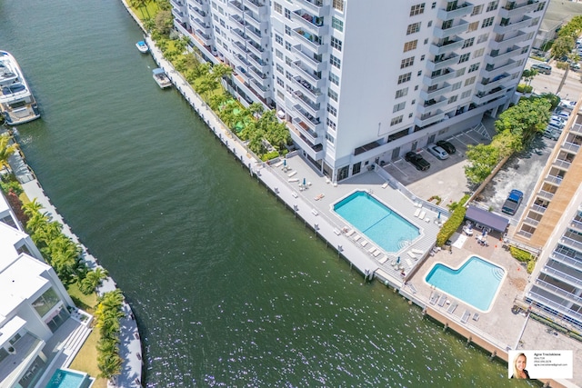 137 Golden Isles Dr Unit 804, Hallandale Beach, FL 33009 - bird's eye view of a pool area, apartment complex / building, and a large body of water