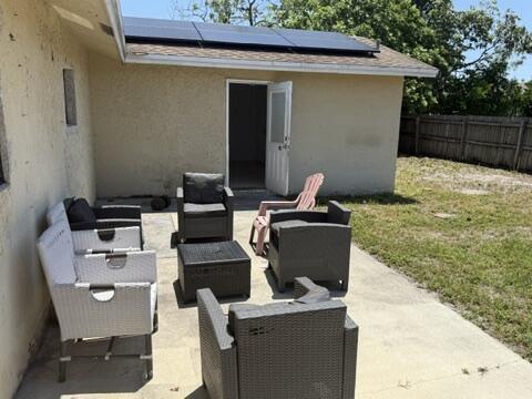 312 NW 18th Ct, Pompano Beach, FL 33060 - view of patio featuring outdoor lounge area