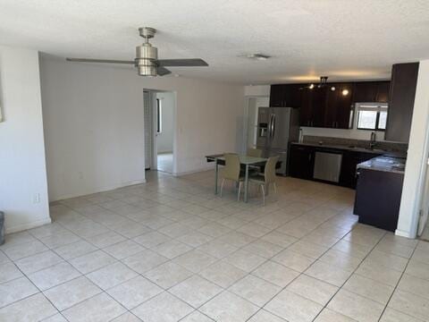 312 NW 18th Ct, Pompano Beach, FL 33060 - kitchen featuring appliances with stainless steel finishes, a sink, open floor plan, and ceiling fan