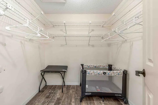 2550 SE Calais St, Port Saint Lucie, FL 34952 - walk in closet with wood finished floors