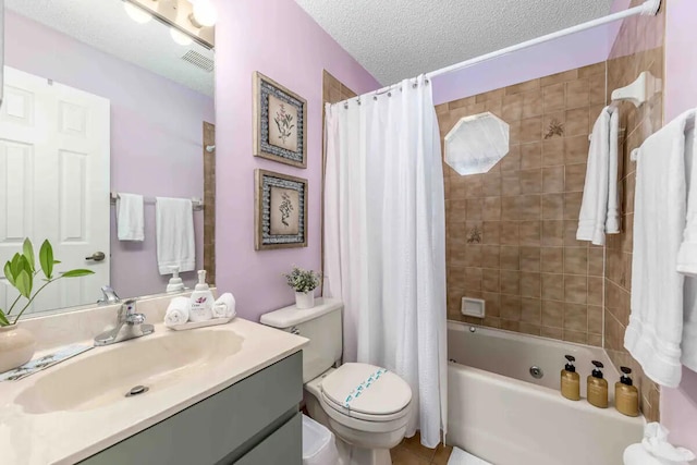 2550 SE Calais St, Port Saint Lucie, FL 34952 - full bath featuring vanity, toilet, shower / bathtub combination with curtain, and a textured ceiling