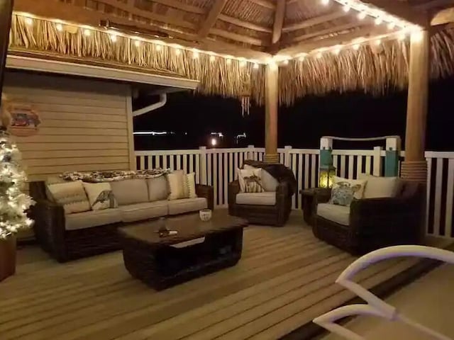 2550 SE Calais St, Port Saint Lucie, FL 34952 - home theater room featuring beam ceiling